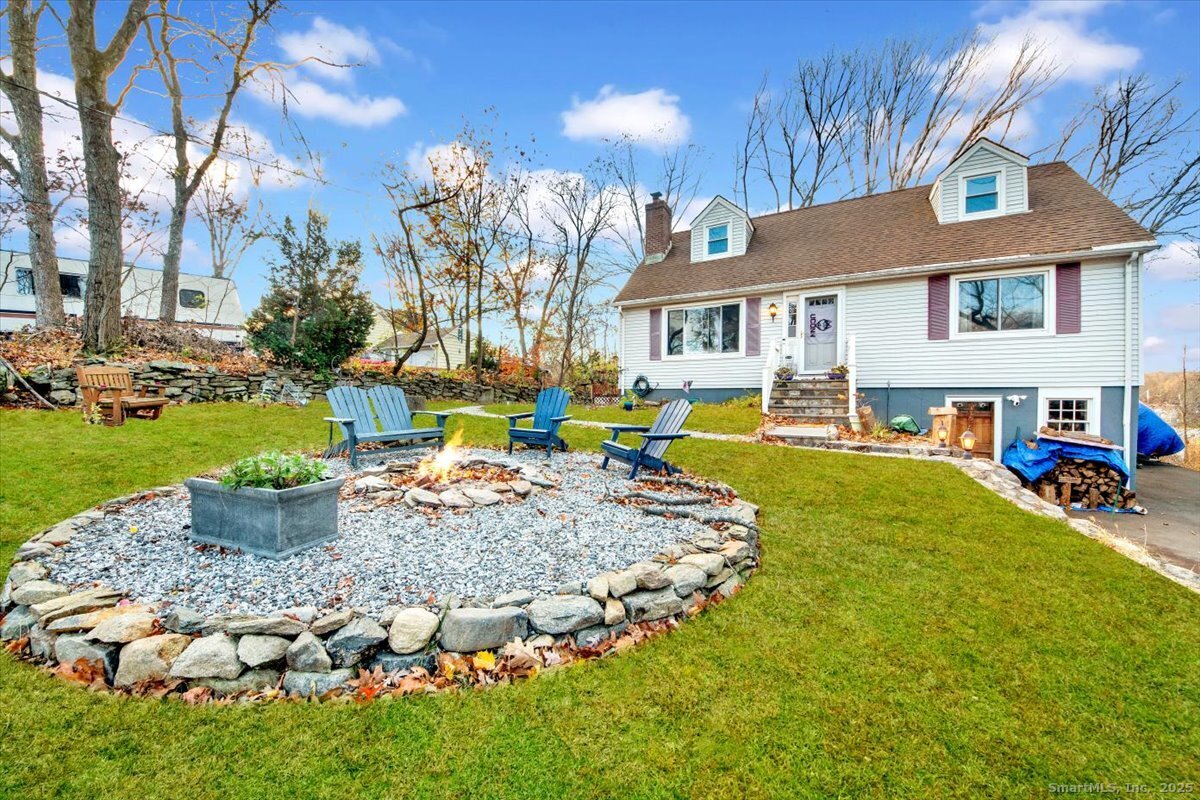 375 Silver Street Bridgeport, CT 06610 - Photo 3 of 21 a view of a house with backyard and sitting area