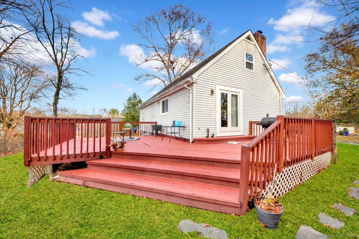 375 Silver Street Bridgeport, CT 06610 - Photo 5 of 21 a view of a house with wooden fence