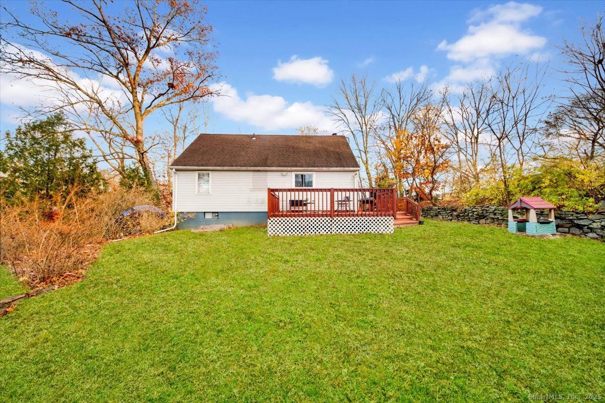375 Silver Street Bridgeport, CT 06610 - Photo 7 of 21 a view of a house with a big yard