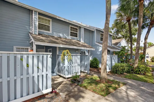 a front view of a house with a porch