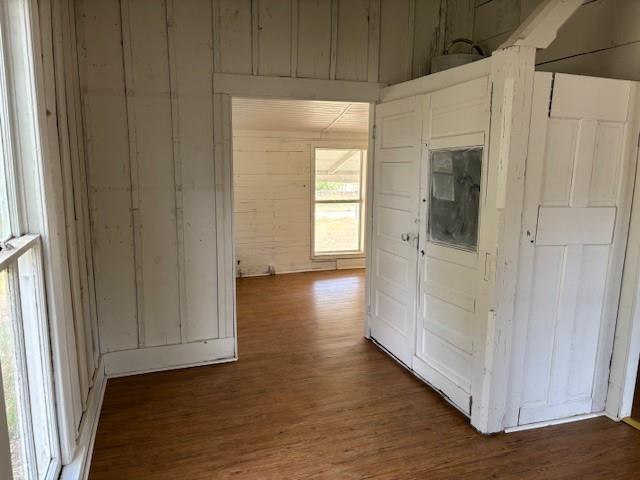 811 West 8th Street Cisco, TX 76437 - Photo 21 of 22 a view of a hallway with wooden floor and cabinet