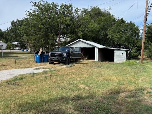811 West 8th Street Cisco, TX 76437 - Photo 22 of 22 a view of a house with a yard and large trees