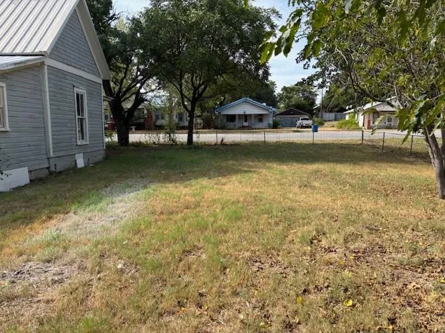 a view of pool with tree s