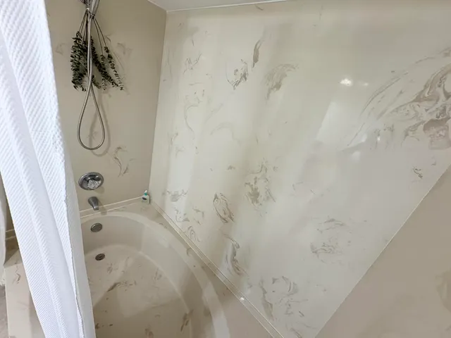 a bathroom with a bathtub