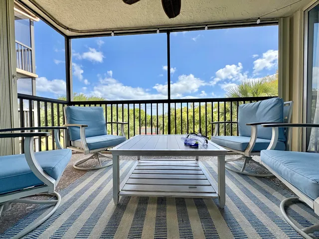 swimming outdoor view with a sitting space