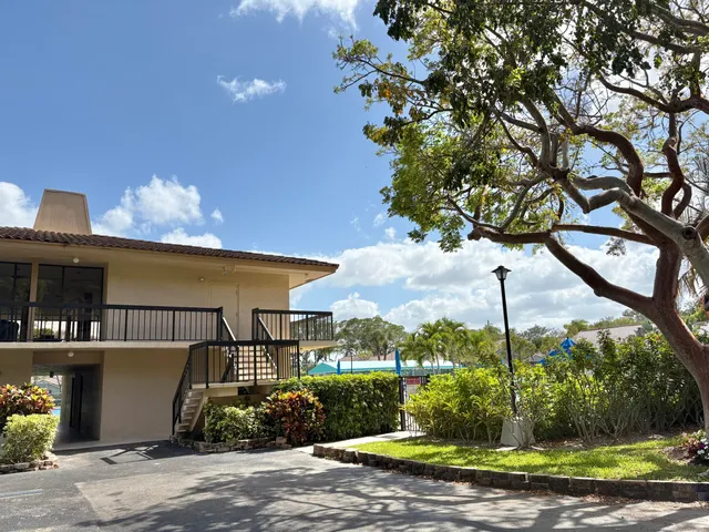 a view of a playground with basketball court