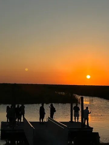 a view of ocean from sunset