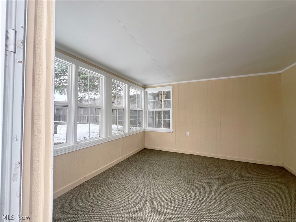 5203 Ridgeland Street Lorain, OH 44055 - Photo 31 of 39 View of carpeted sunroom
