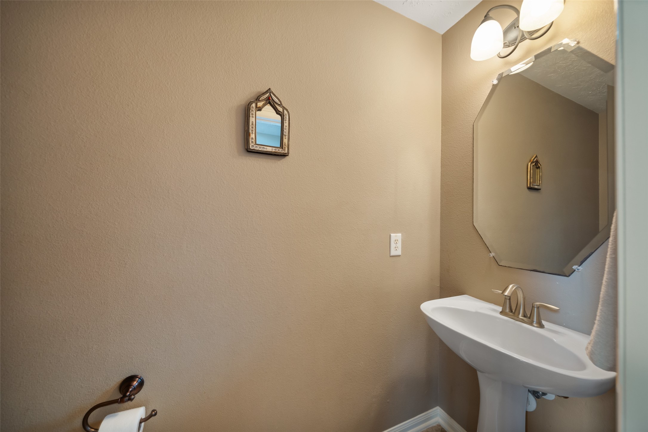 6407 Ashley Manor Drive Spring, TX 77389 - Photo 22 of 41 a bathroom with a sink and a mirror