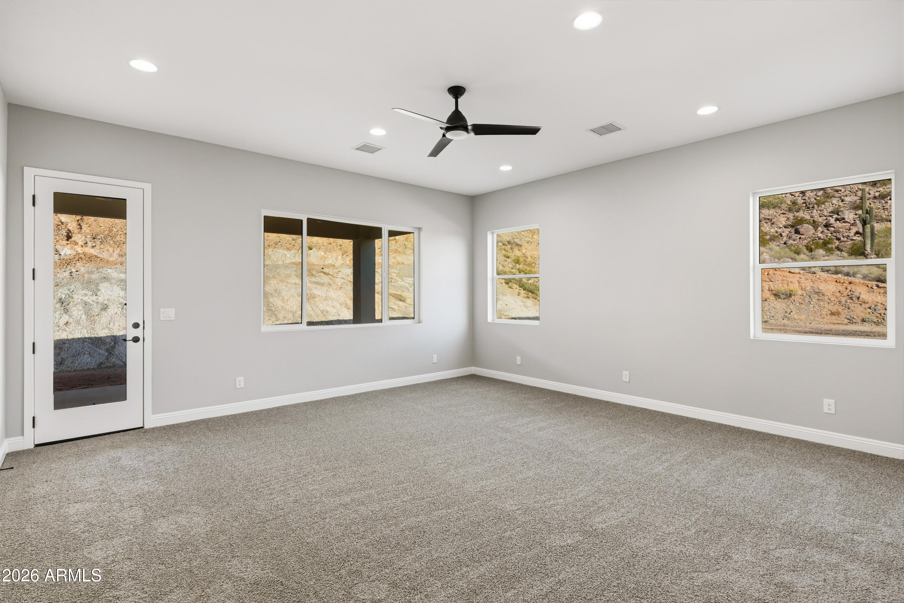 1687 East Creek Canyon Road Phoenix, AZ 85086 - Photo 12 of 31 a view of an empty room with a window