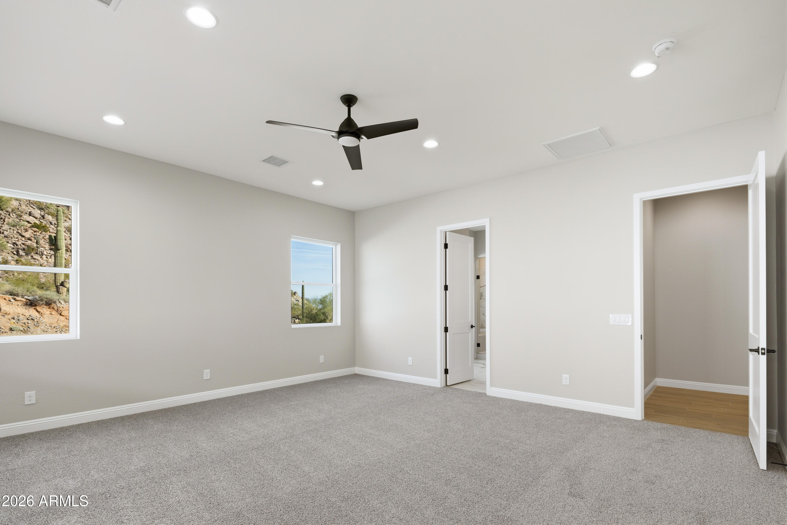 1687 East Creek Canyon Road Phoenix, AZ 85086 - Photo 13 of 31 a view of an empty room with a window
