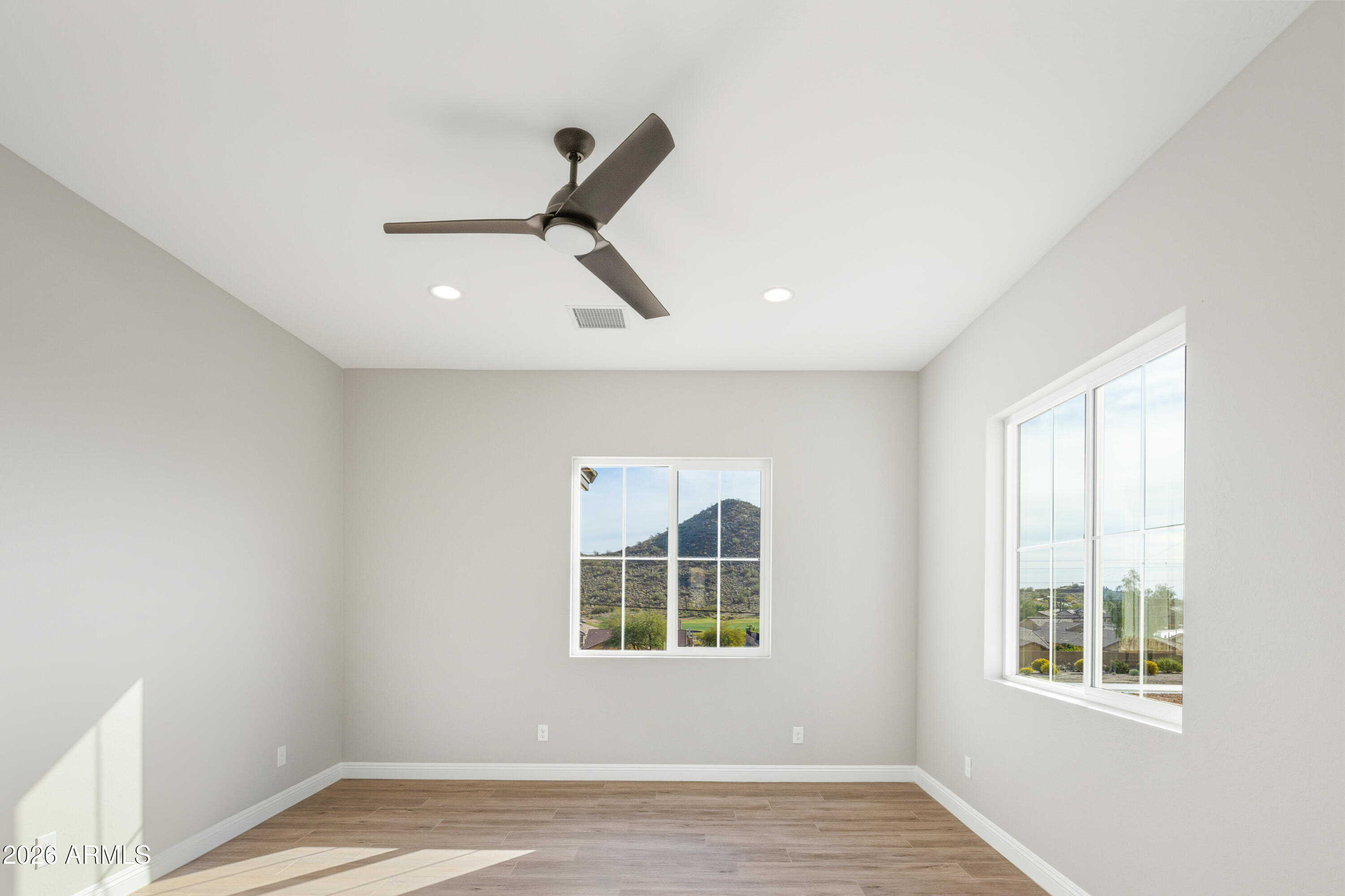 1687 East Creek Canyon Road Phoenix, AZ 85086 - Photo 14 of 31 an empty room with windows and closet