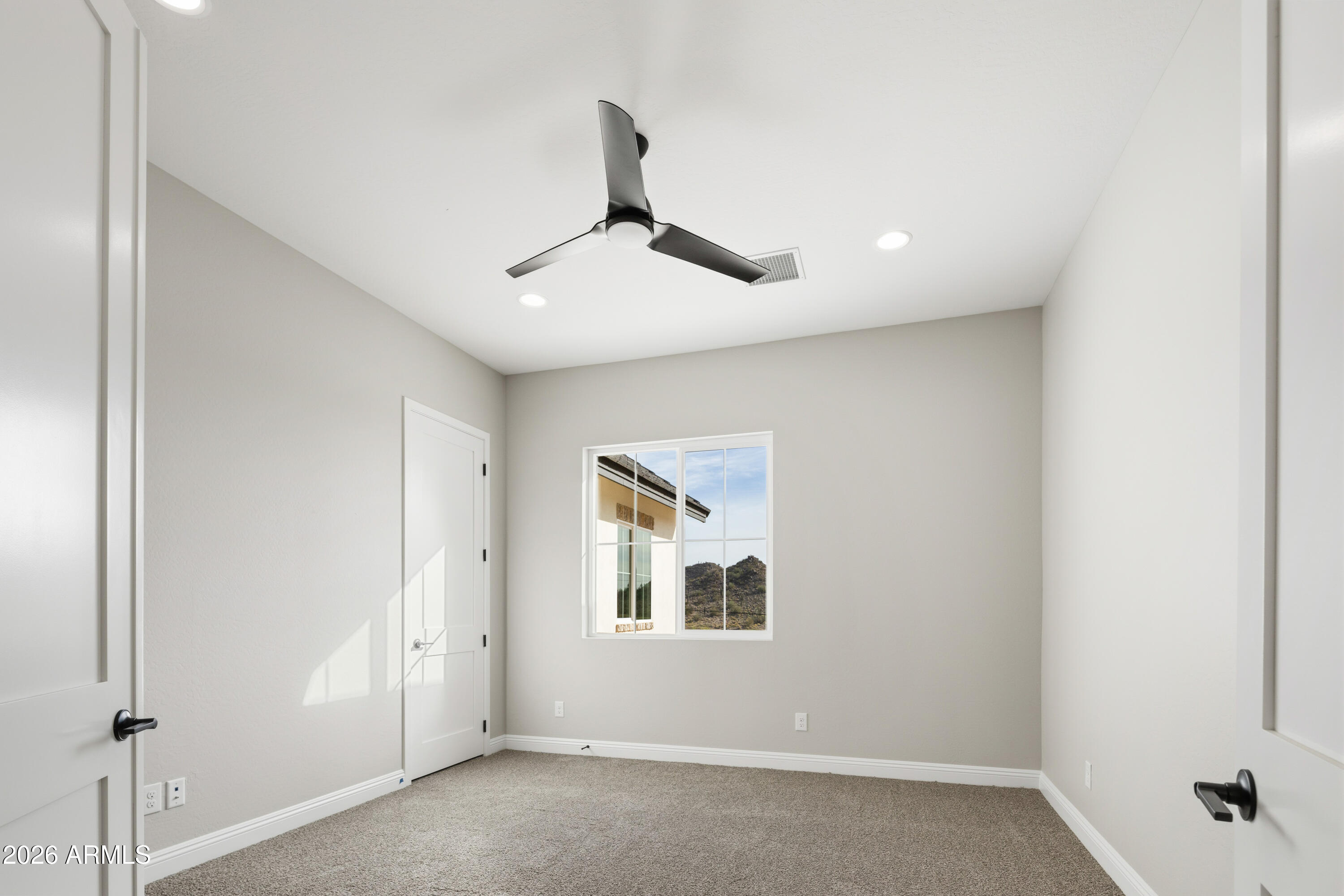 1687 East Creek Canyon Road Phoenix, AZ 85086 - Photo 15 of 31 a view of an empty room with a window