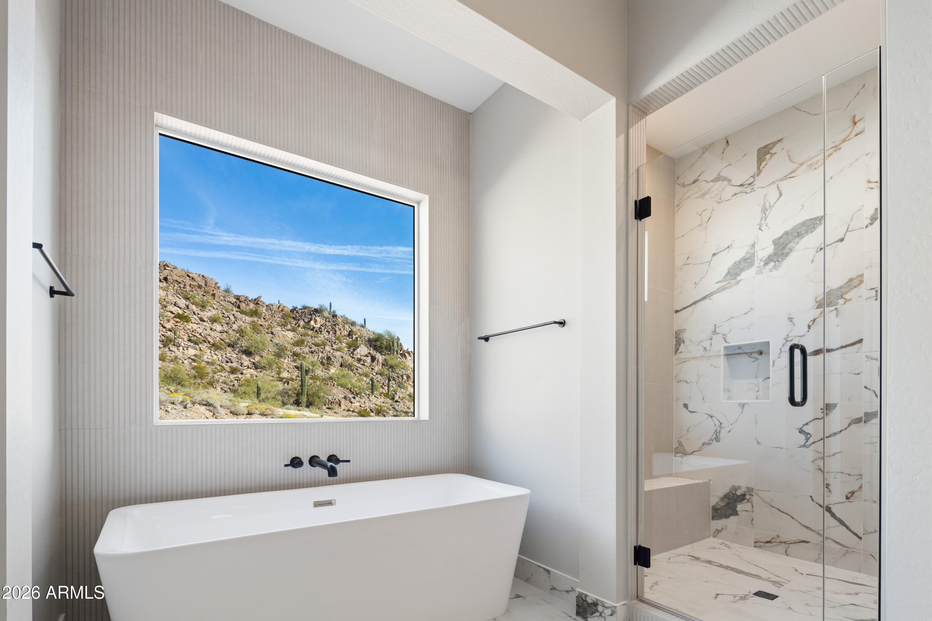 1687 East Creek Canyon Road Phoenix, AZ 85086 - Photo 20 of 31 a bathroom with a bathtub and sink