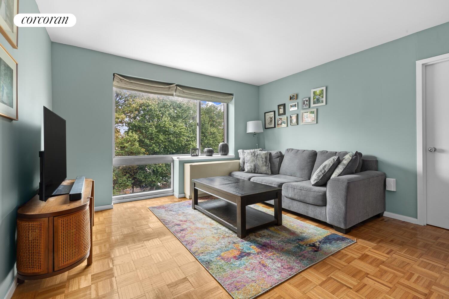 a living room with a couch and a flat screen tv