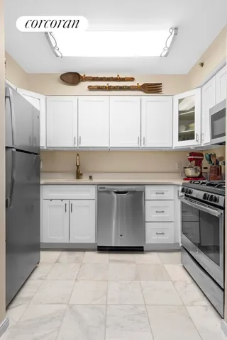 a living room with a couch and a flat screen tv