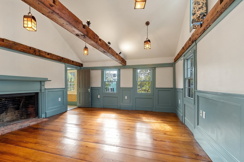 156 Hale Street Beverly, MA 01915 - Photo 22 of 42 a view of livingroom with hardwood floor and kitchen