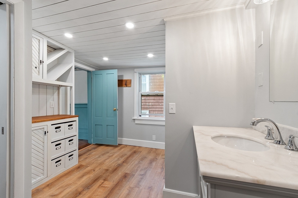 156 Hale Street Beverly, MA 01915 - Photo 26 of 42 a bathroom with a sink and a mirror