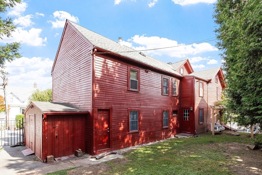 156 Hale Street Beverly, MA 01915 - Photo 33 of 42 a view of a house with a yard