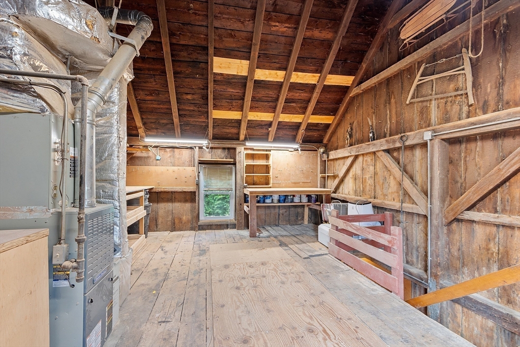 156 Hale Street Beverly, MA 01915 - Photo 39 of 42 a view of a backyard with table and chairs