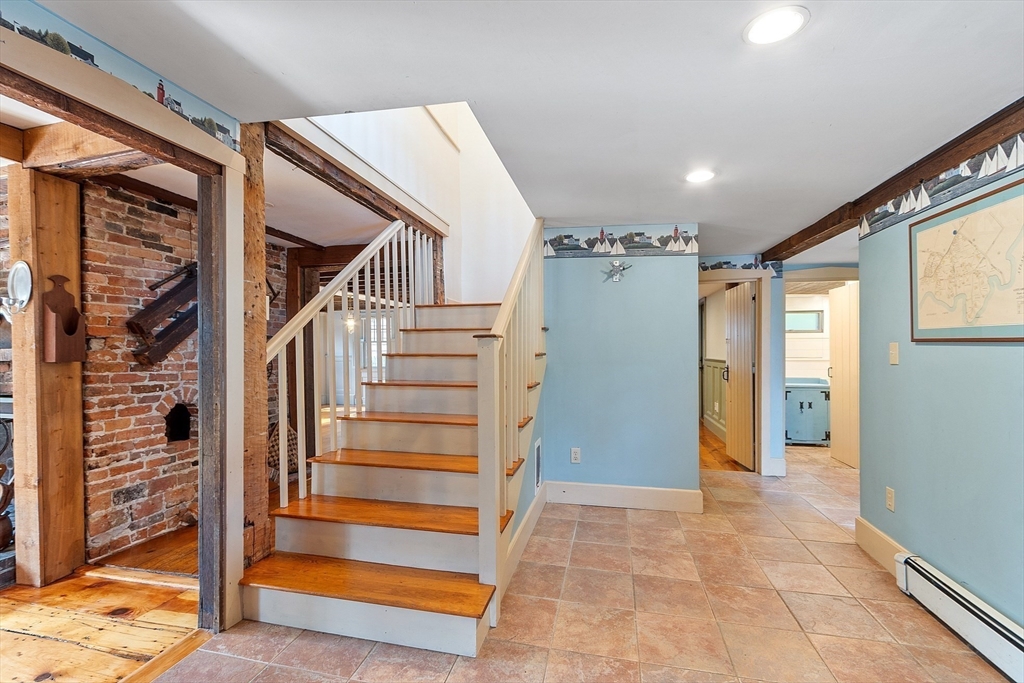 156 Hale Street Beverly, MA 01915 - Photo 8 of 42 a view of entryway with stairs and wooden floor