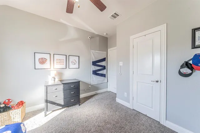 a view of workspace with cabinet and window