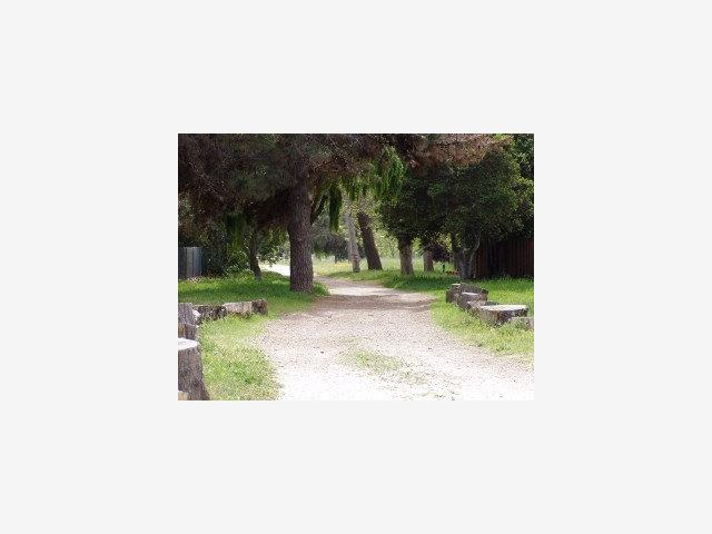 22673 Coleta Drive Salinas, CA 93908 - Photo 6 of 7 a picture of a bench in front of a house