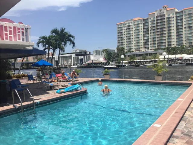 a front view of building with outdoor seating
