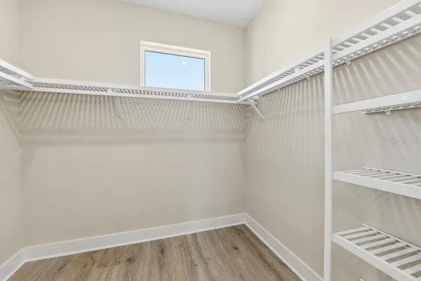 a view of a room with racks on the wall
