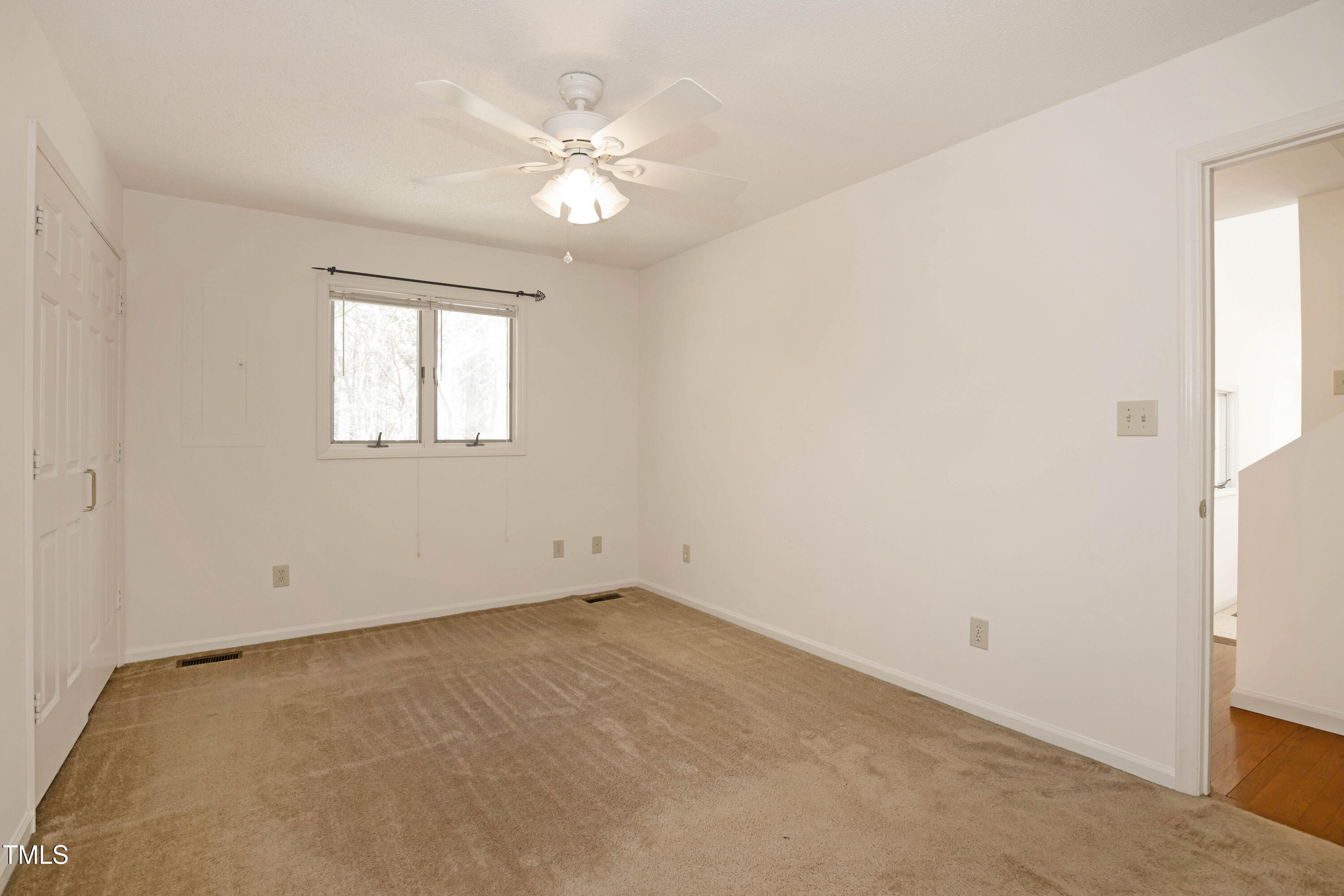 7409 Birch Tree Lane Wake Forest, NC 27587 - Photo 39 of 72 an empty room with windows