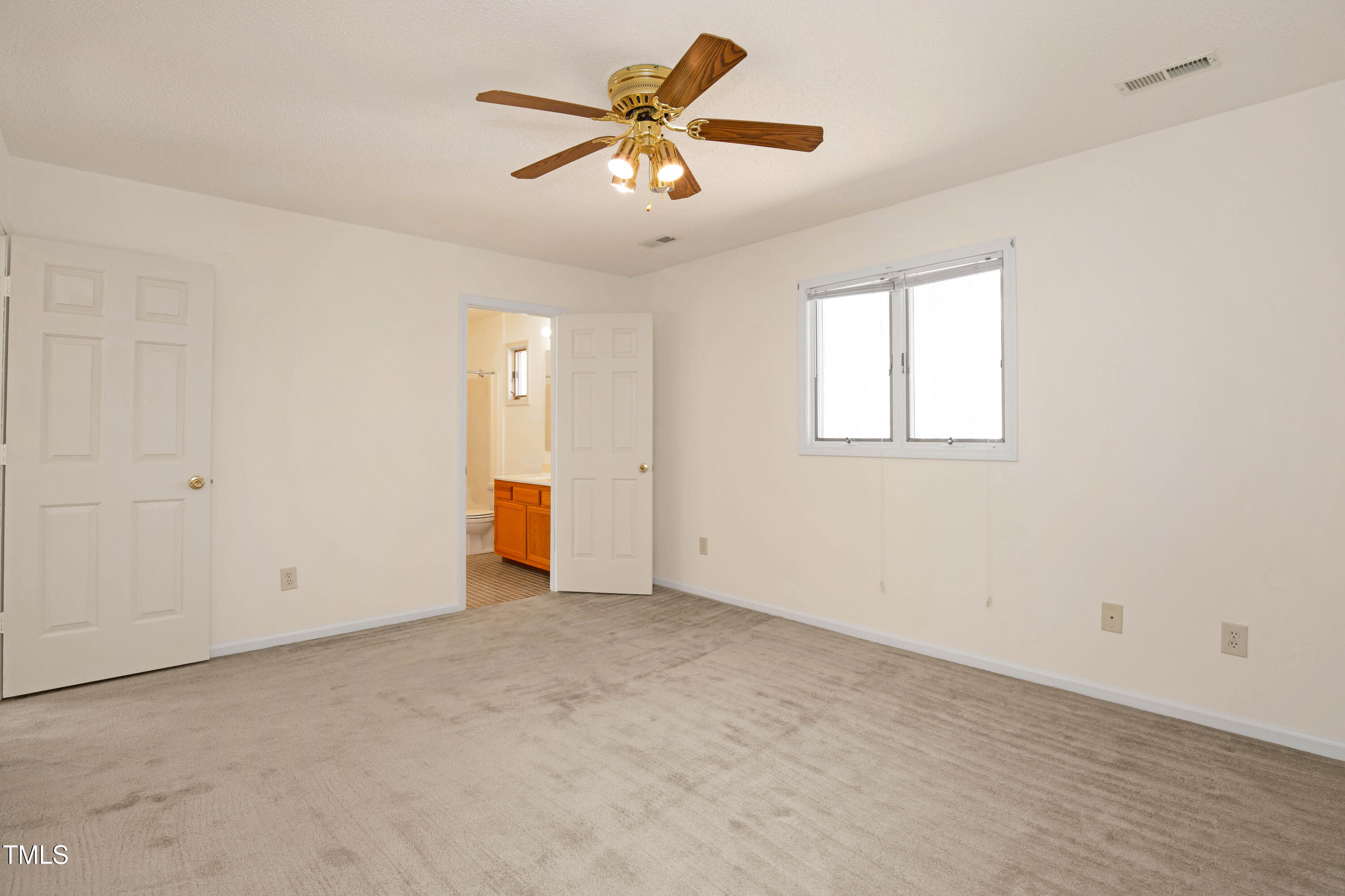 7409 Birch Tree Lane Wake Forest, NC 27587 - Photo 46 of 72 an empty room with closet and a ceiling fan