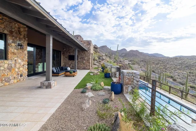 a view of a terrace with sitting area