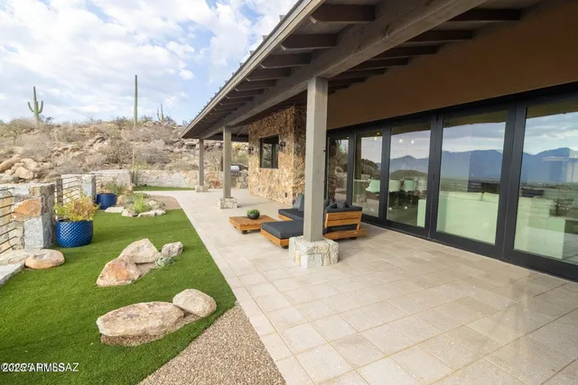 a view of a porch with furniture