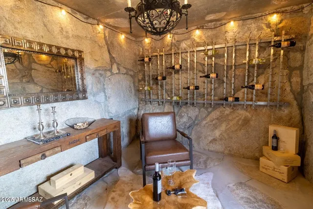 a bathroom with a sink and mirror