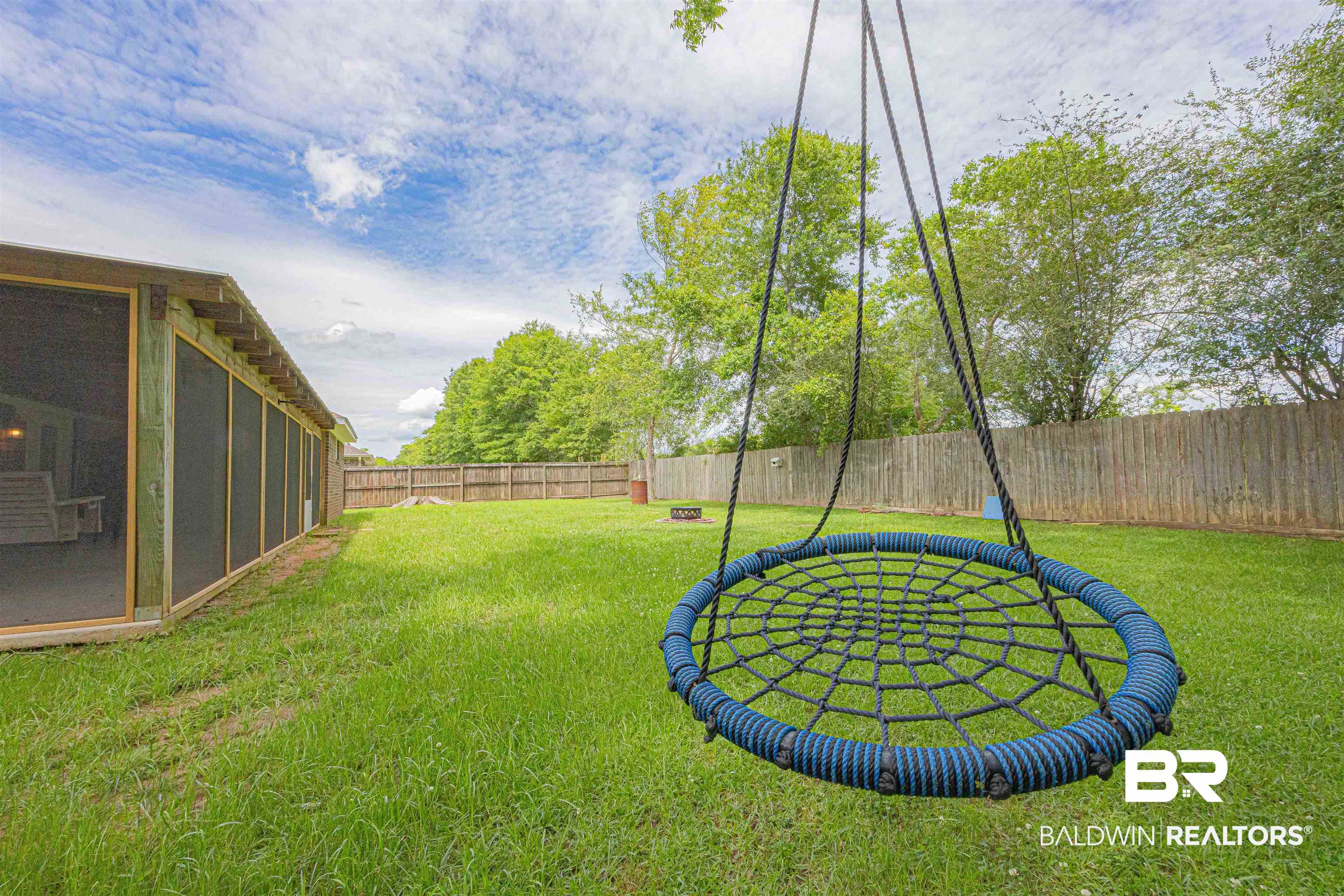18675 Explorer Drive Loxley, AL 36551 - Photo 40 of 42 View of yard with a sunroom