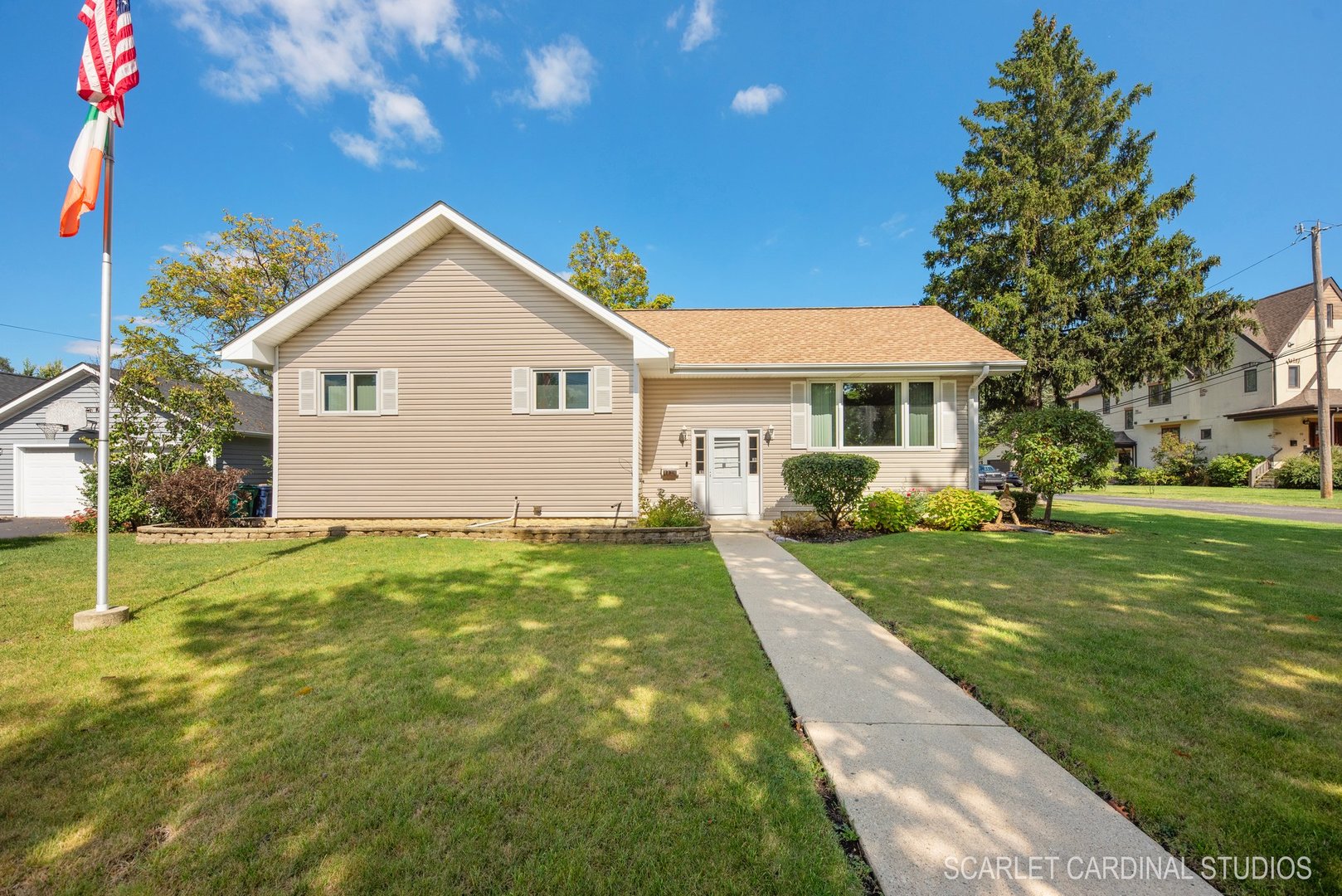 204 West Harding Road Lombard, IL 60148 - Photo 1 of 18 a front view of a house with a yard