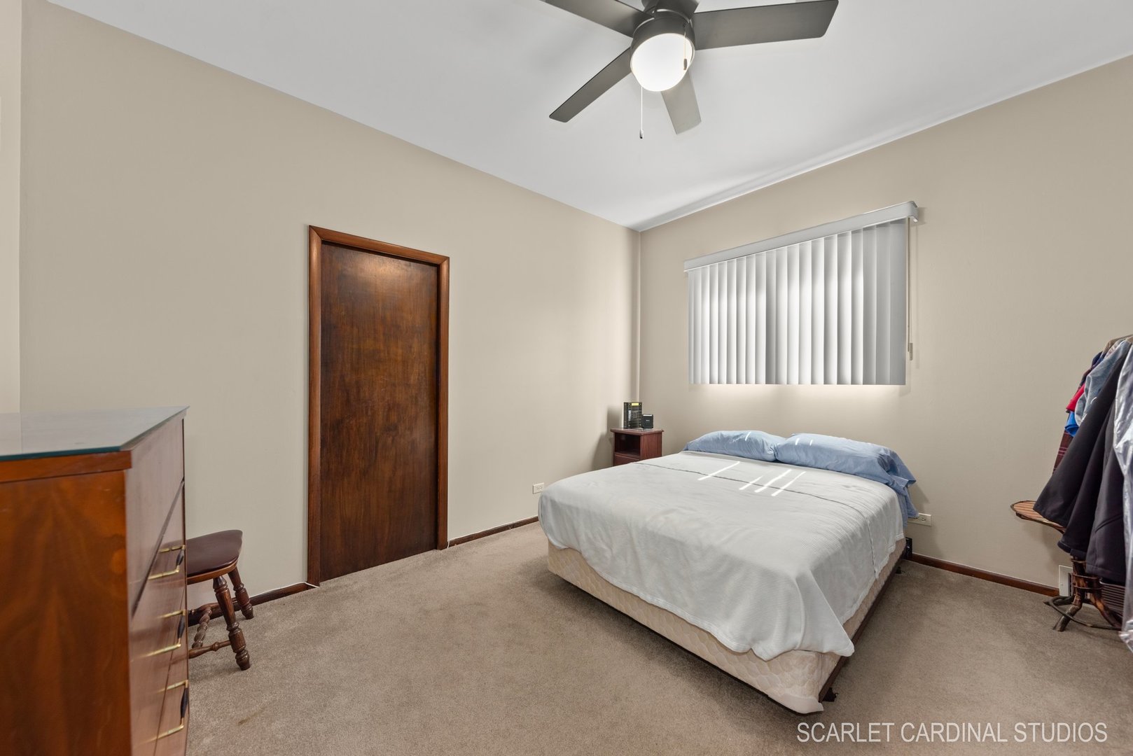 204 West Harding Road Lombard, IL 60148 - Photo 12 of 18 a bedroom with a bed wall painting and a window
