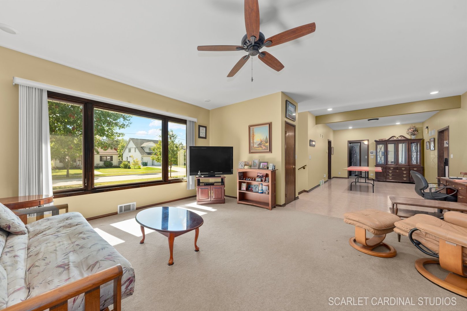 204 West Harding Road Lombard, IL 60148 - Photo 5 of 18 a living room with furniture and a large window