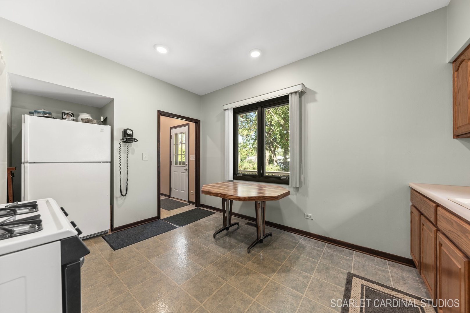 204 West Harding Road Lombard, IL 60148 - Photo 6 of 18 a view of a livingroom with furniture and a window