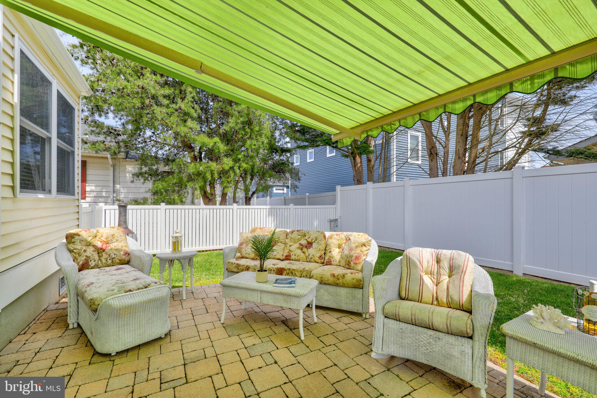 13802 Fiesta Road Ocean City, MD 21842 - Photo 29 of 50 Retractable Shade Awning