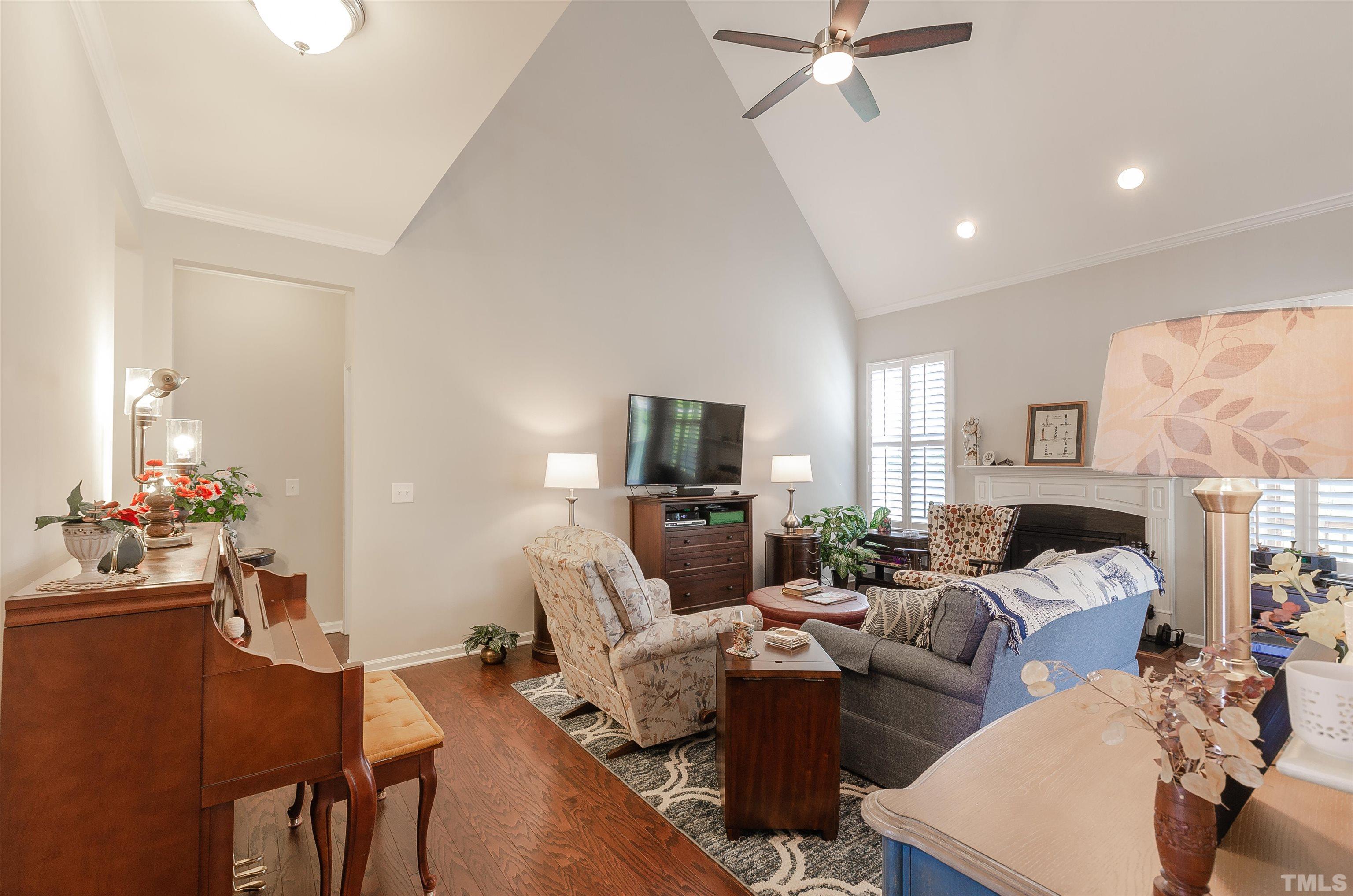 1104 Big Spring Circle Durham, NC 27703 - Photo 24 of 47 a living room with furniture and a fireplace