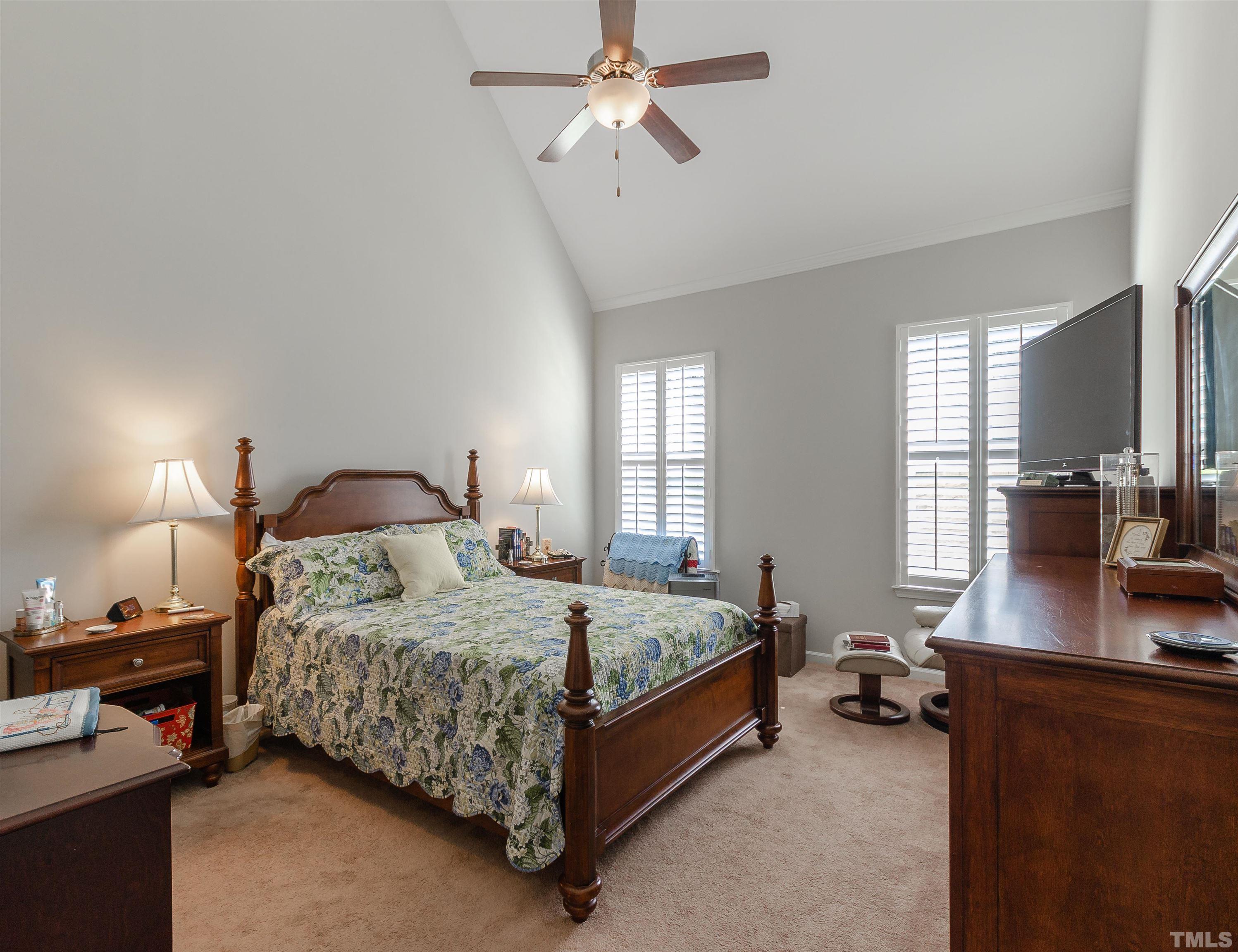 1104 Big Spring Circle Durham, NC 27703 - Photo 25 of 47 a bedroom with a bed gym equipment and a window