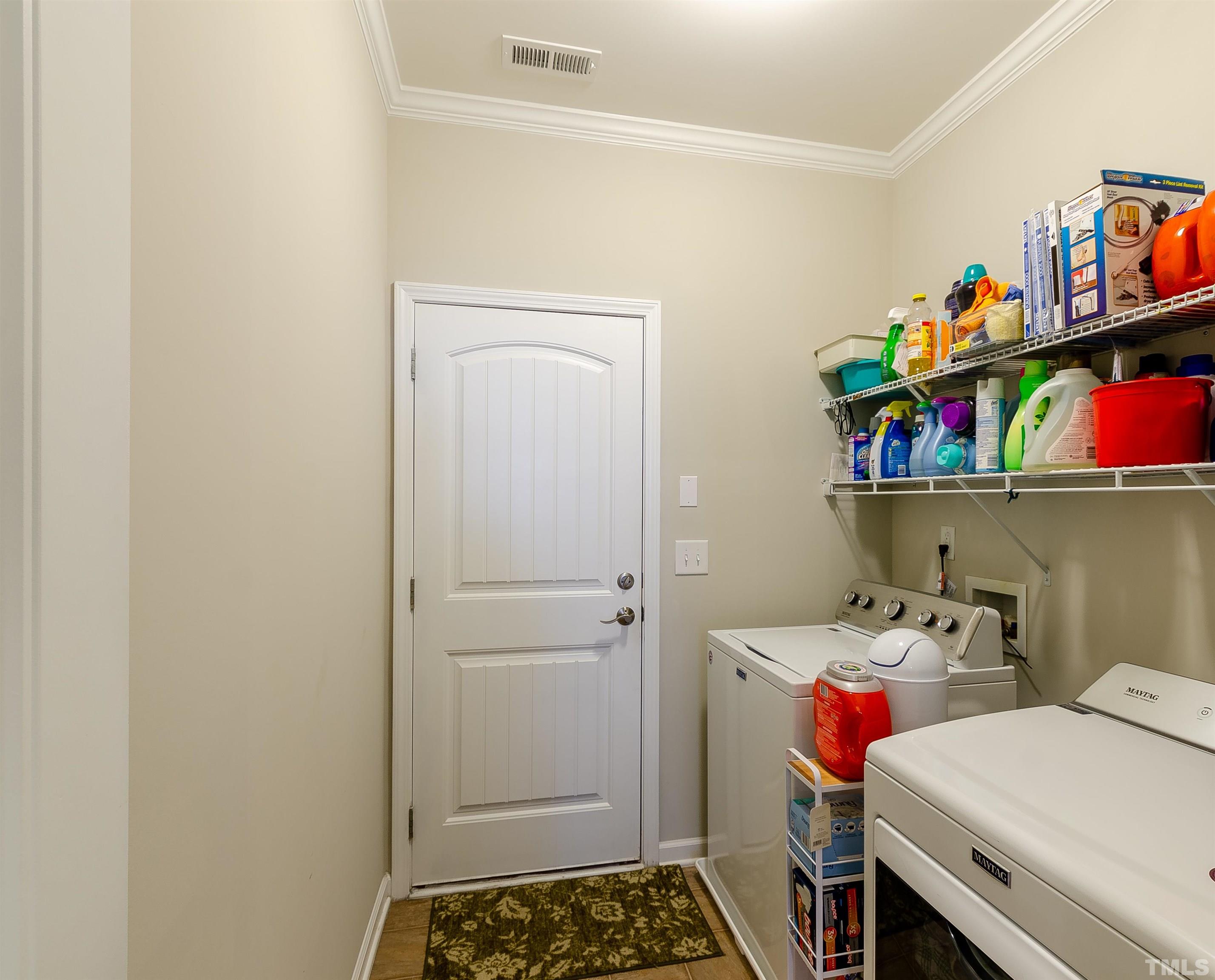 1104 Big Spring Circle Durham, NC 27703 - Photo 30 of 47 a storage room with washer and dryer