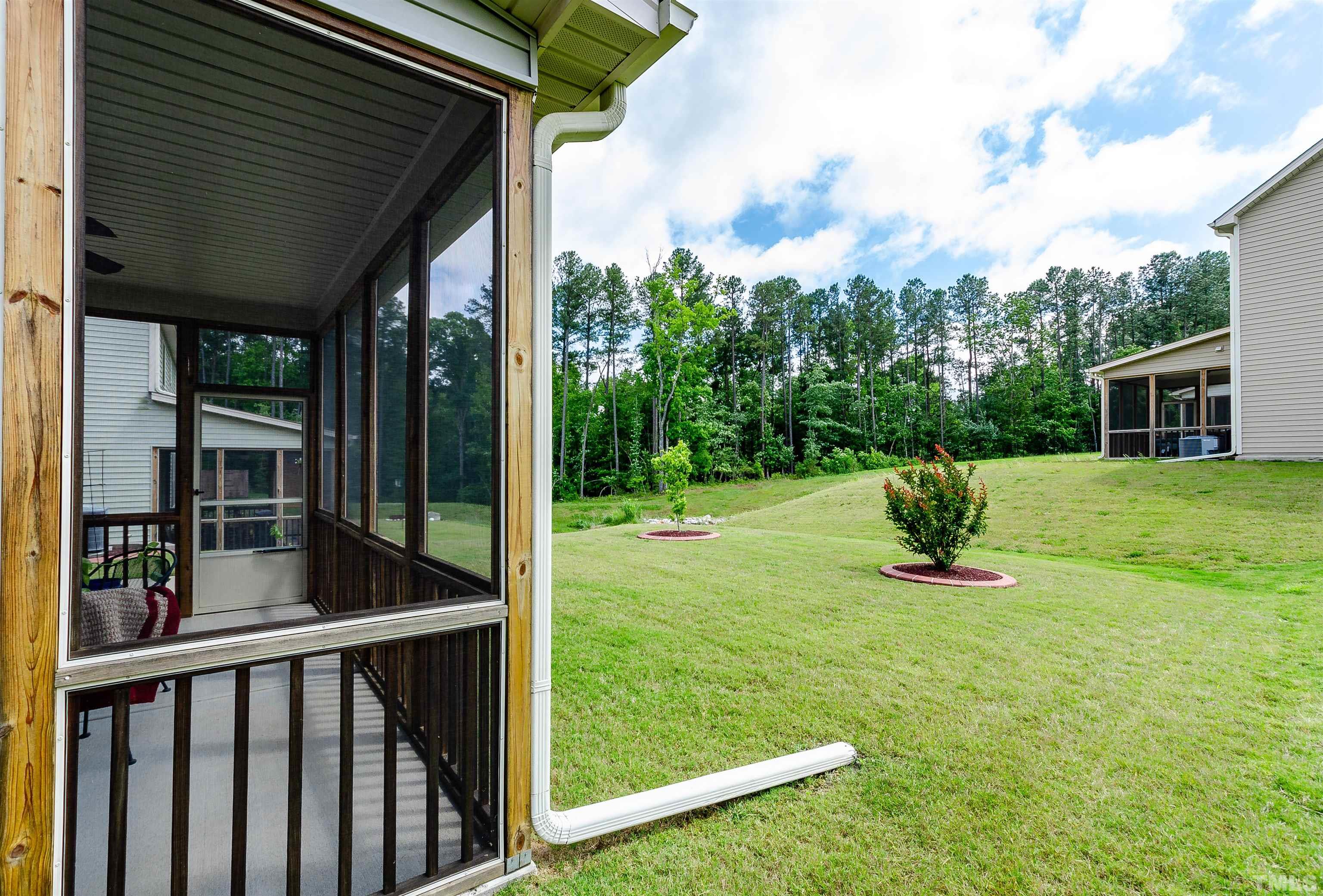 1104 Big Spring Circle Durham, NC 27703 - Photo 42 of 47 a view of a house with backyard and sitting area