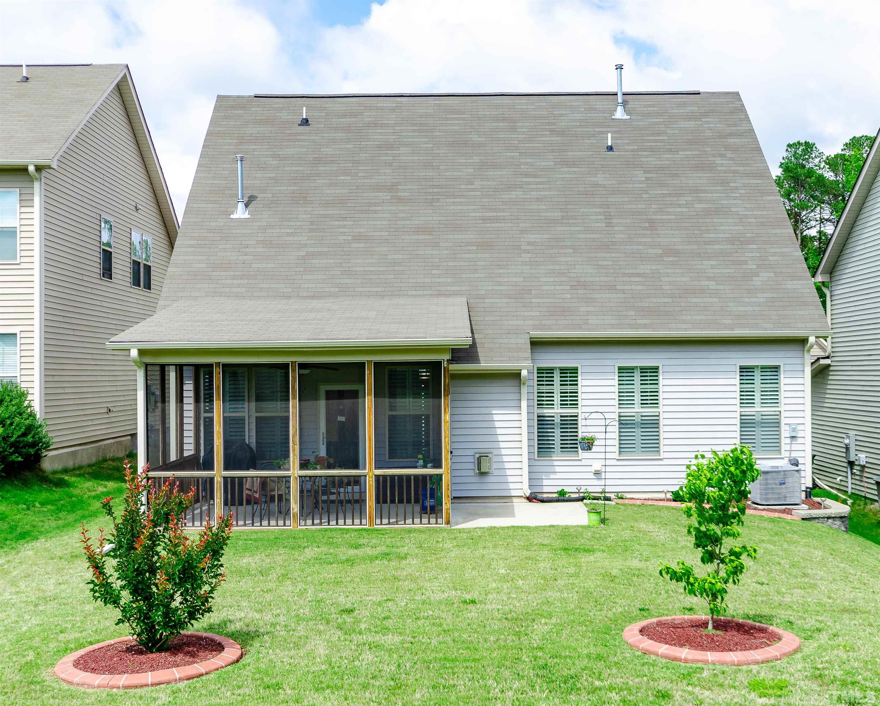1104 Big Spring Circle Durham, NC 27703 - Photo 45 of 47 a front view of a house with a yard