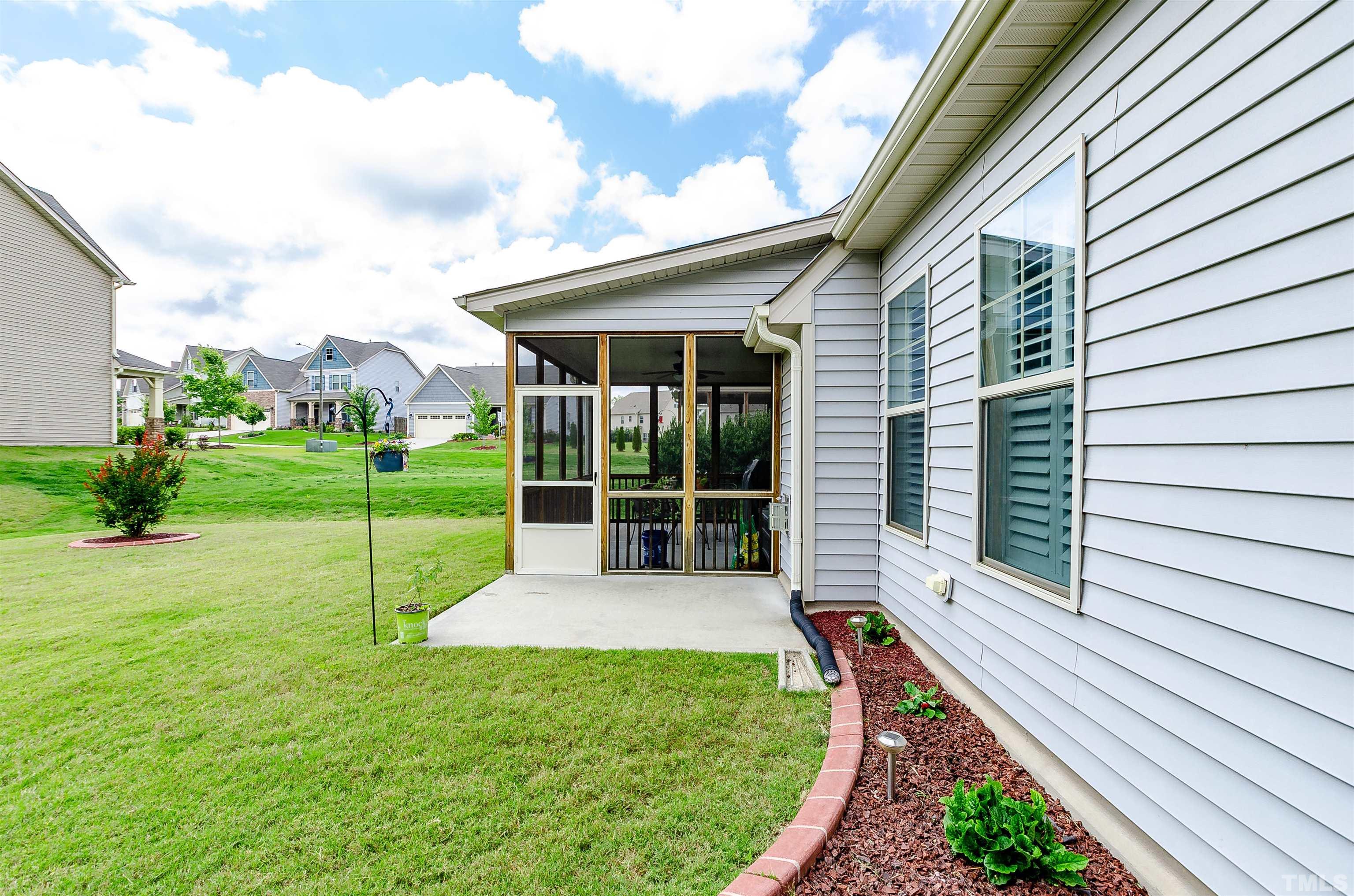 1104 Big Spring Circle Durham, NC 27703 - Photo 46 of 47 a house view with a garden space