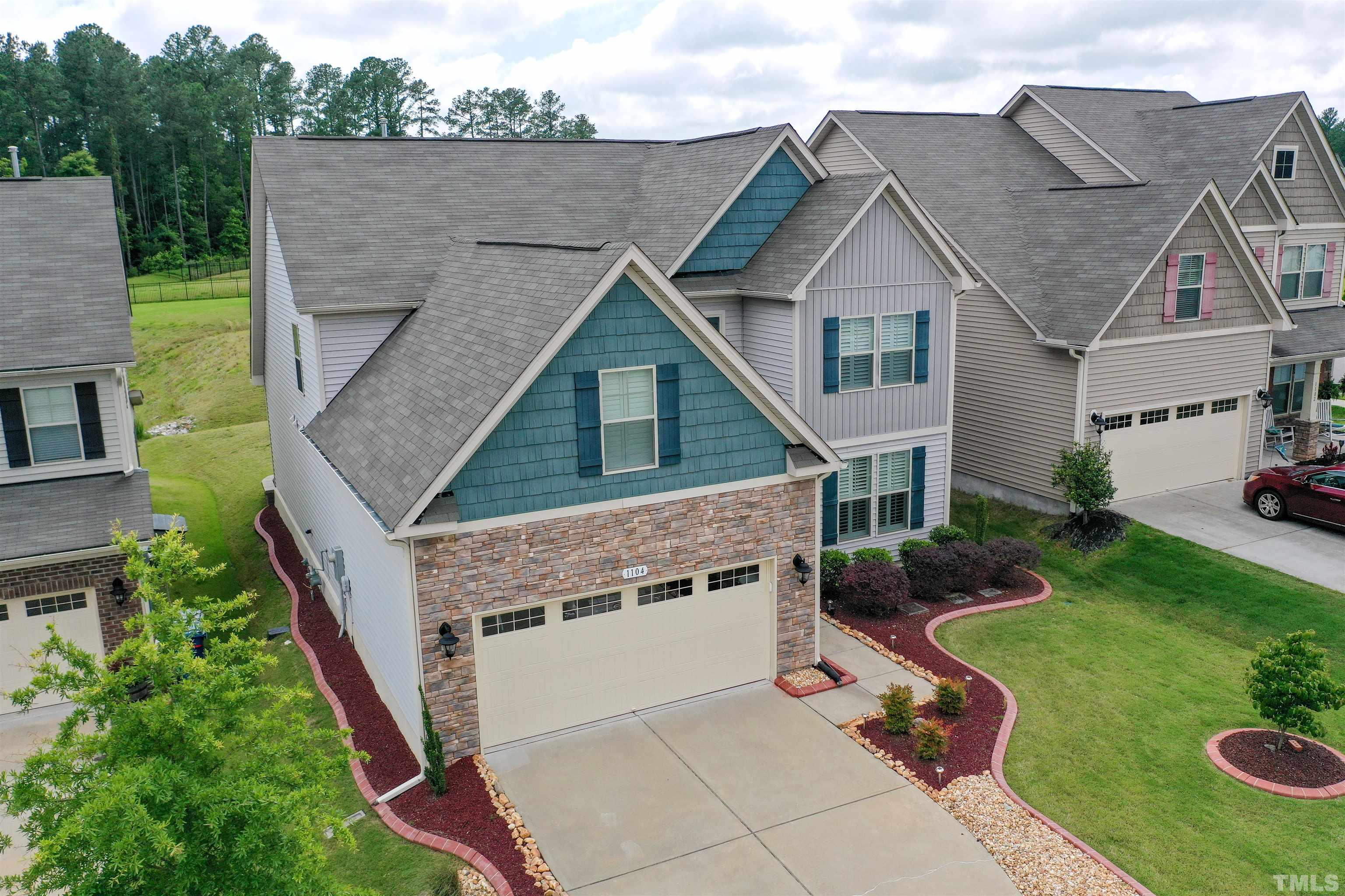 1104 Big Spring Circle Durham, NC 27703 - Photo 9 of 47 a aerial view of a house with a yard