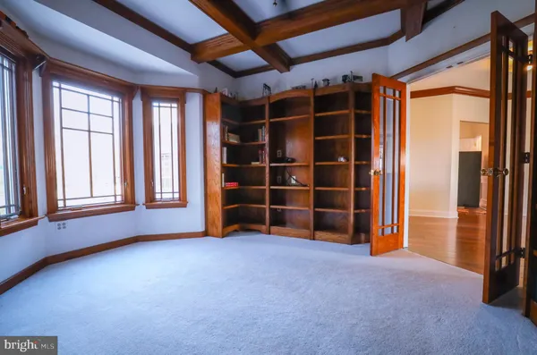 an empty room with windows