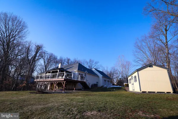 a view of a house with a big yard