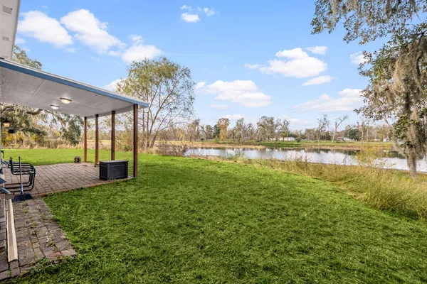 a view of a lake with a big yard